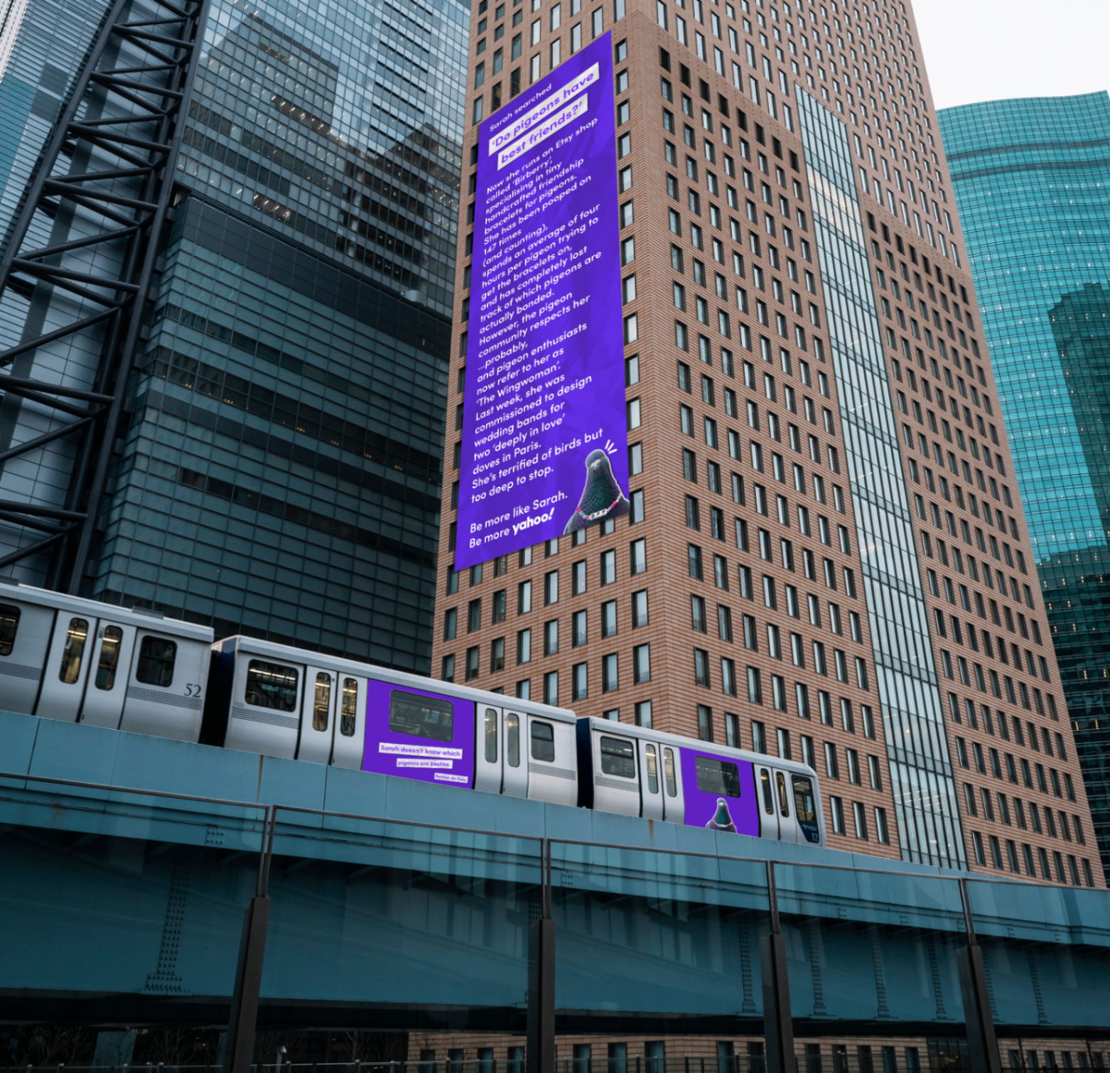 Sarah Yahoo scroll mockup on a tower beside matching train carriage placements.