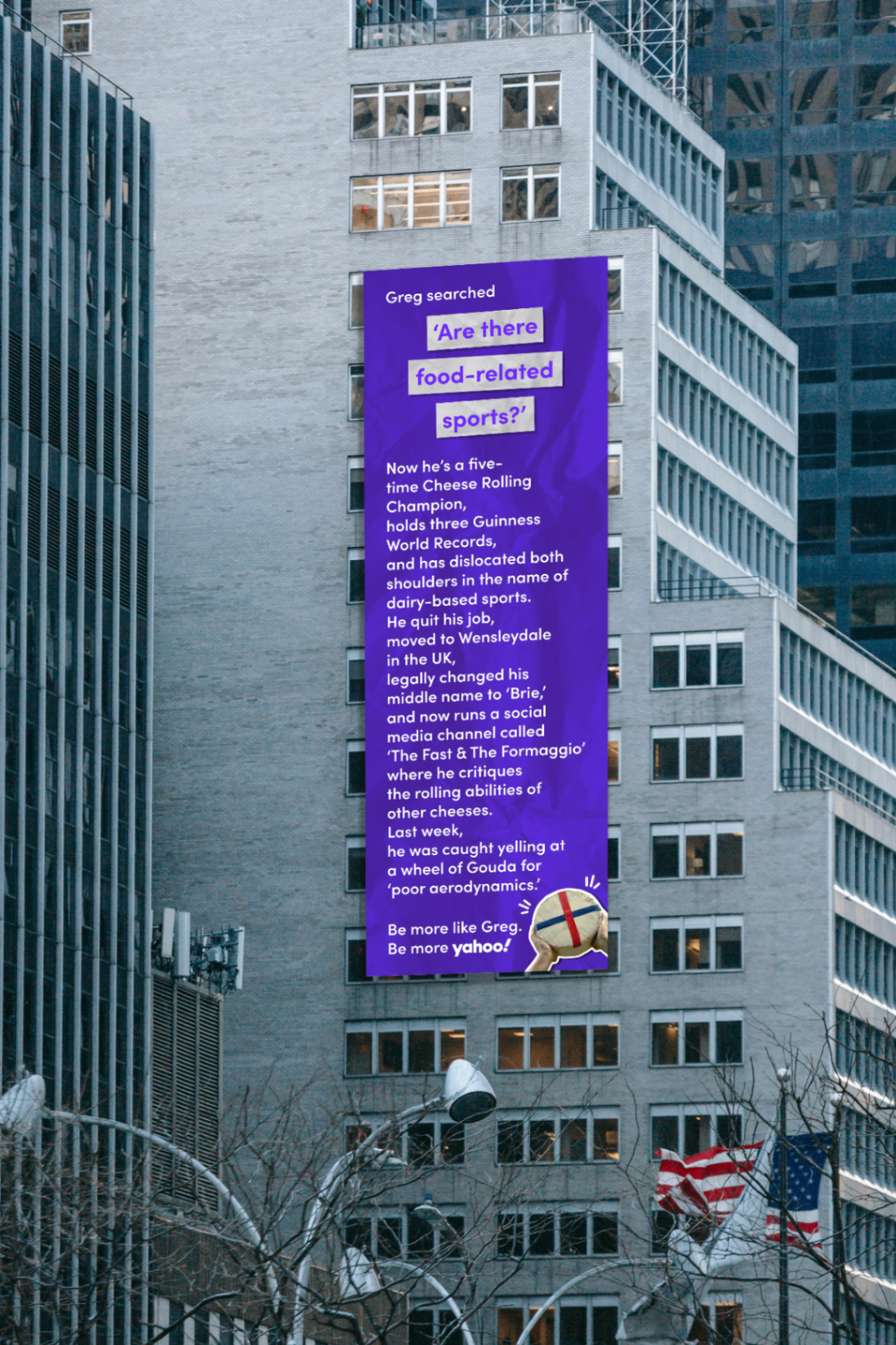 Greg Yahoo scroll mockup mounted high on a city building.